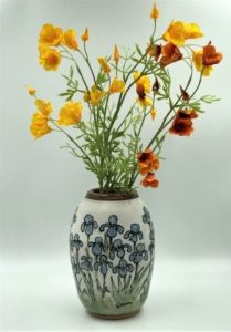 image of a pot with flowers