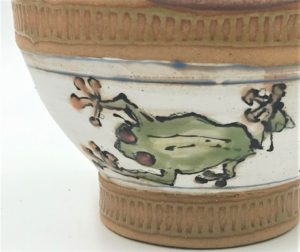 ceramic bowl with frog design