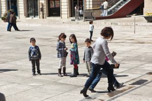 children in the plaza in Lleida, Spain