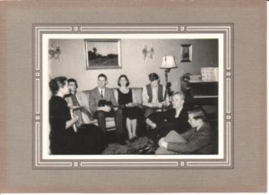 (Miss Ganter's music class at a student's home. Roger is third from the right.)