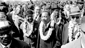 Black people wearing Hawaiian leis, including Martin Luther King Jr.