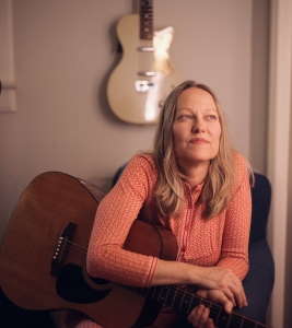 Young woman with guitar