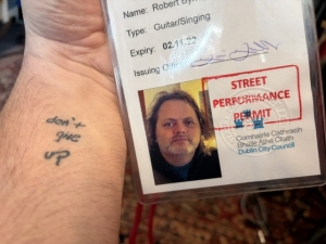My tattoo and my busking permit for Dublin